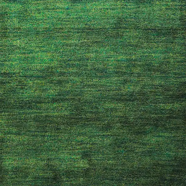 Forest green woven carpet flooring with subtle texture