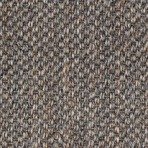 tightly woven sisal carpet in neutral tones.